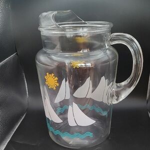 Vintage Clear Glass Pitcher with Sailboat, Sun & Waves Design With Ice Lip 9" H